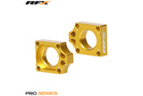 Chain Tensioners / Axle Blocks RFX Pro yellow Suzuki RM-Z 250 / 450